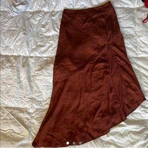 Burgundy/brown Free People skirt with adorable shape and a side slit.